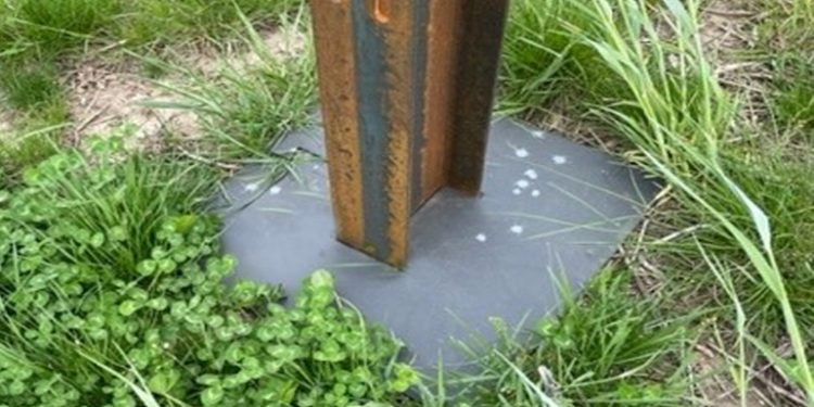 Interlocking PVC matting suggested as weed barrier on solar project piles