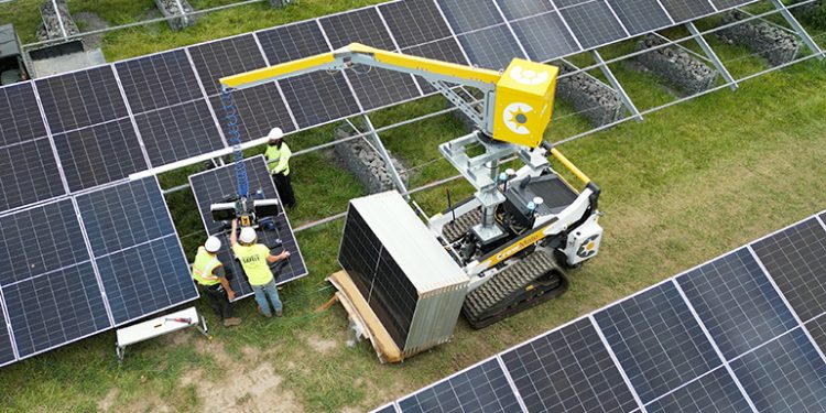 New semi-autonomous vehicle helps to lift solar panels in the field