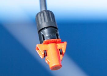 Premier PV harnessing solutions to use advanced connector cap from AWM