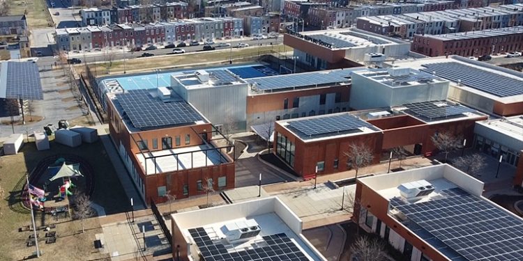 Climate Access Fund flips switch on community solar project at Baltimore public school
