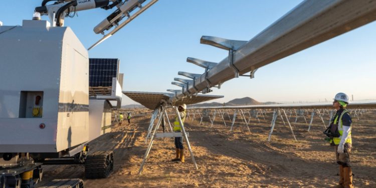 Robots install 100 MW of solar panels on 1-GW AES project