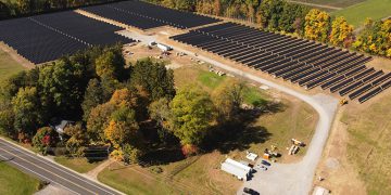 Distributed Energy Infrastructure installs community solar projects through heavy snowfall